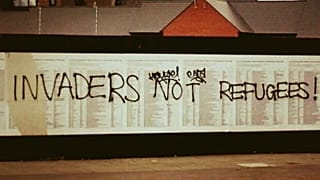 ‘Invaders not refugees’: UK migrant memorial defaced again