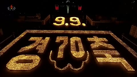 Fires of passion: North Korea holds torch parade