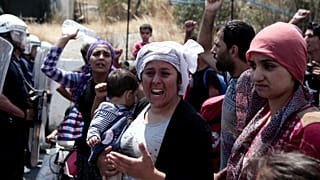 Refugees and migrants from the camp of Moria, in Lesbos, Greece.