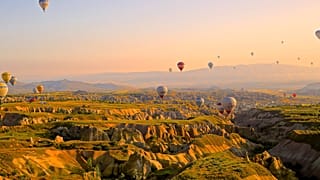 Tourists return to take flight in hot air balloons in Cappadocia, Turkey 
