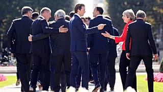 Theresa May is trying to negotiate a Brexit deal