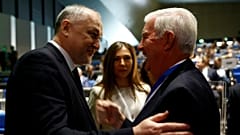Craig Reedie, presidente da AMA, com Yuri Ganus, diretor da RUSADA
