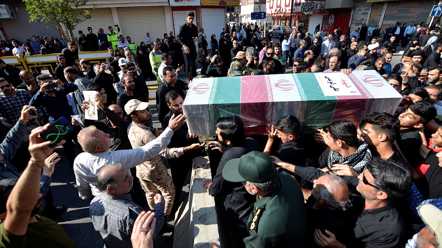 Iran vows to fight terrorism as 22 are arrested over parade attack