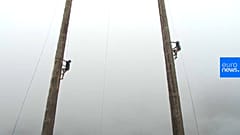 World pole climbing champ retains title in UK