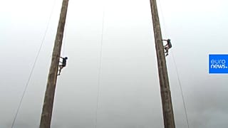 World pole climbing champ retains title in UK