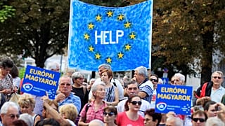 People attend a demonstration against Hungary's Viktor Orban in Budapest