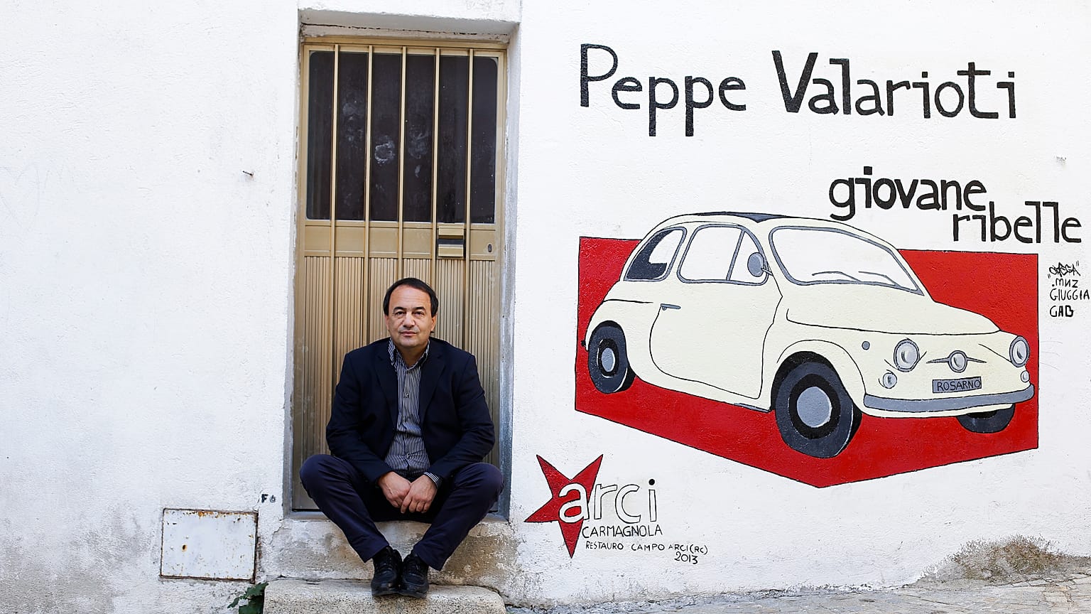 Italian mayor, famed for work with migrants, arrested for 'helping illegal immigration'