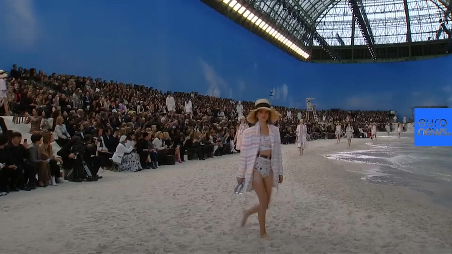 Catwalk turned into beach for Paris Fashion Week show
