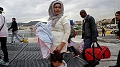 migrant child island of Lesbos