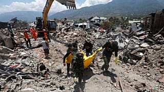 Getting aid to Indonesia's tsunami survivors slowed by destruction