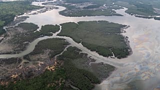 the Niger delta where signs of oil spills can be seen in Port Harcourt
