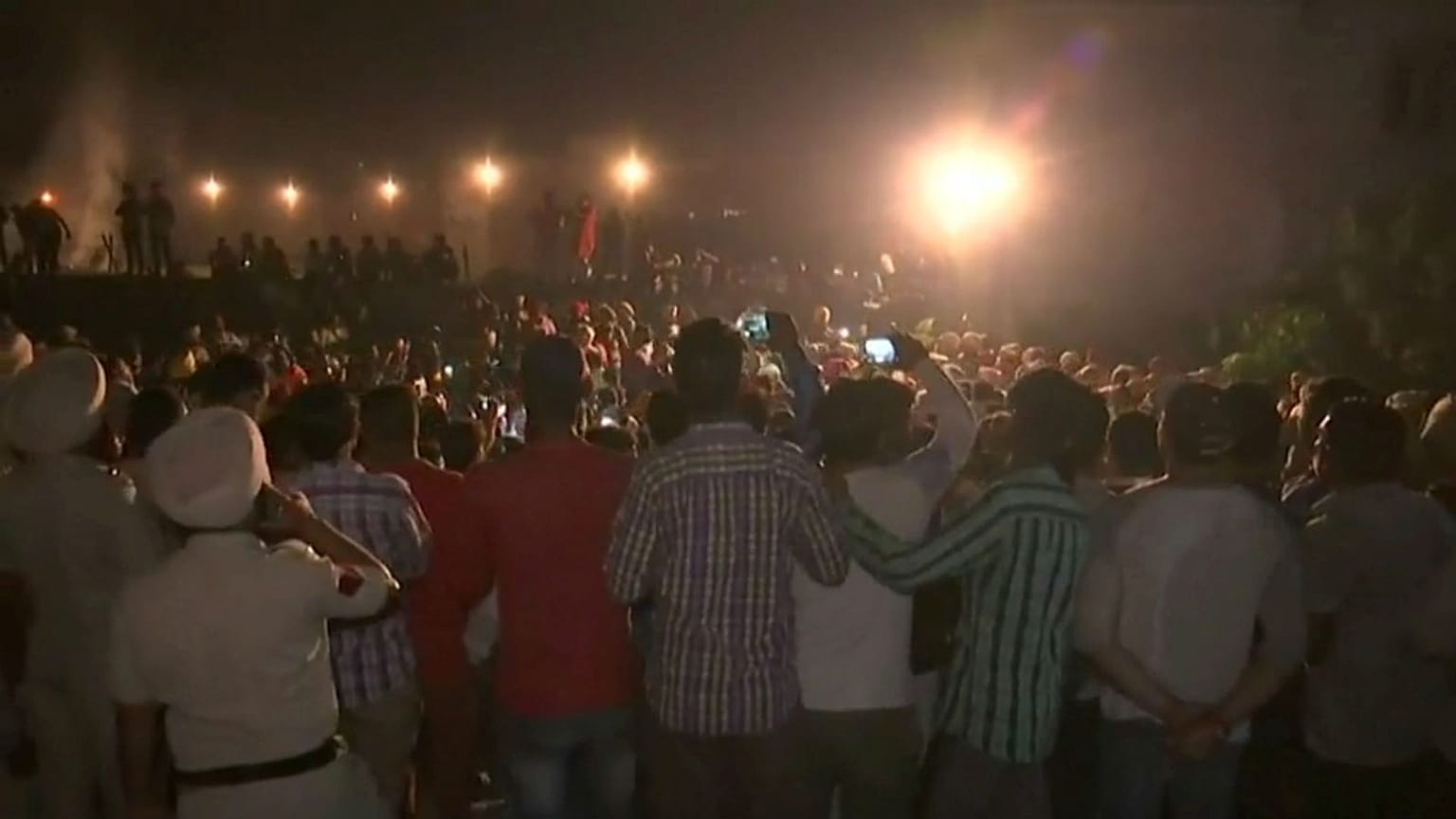 Train runs over crowd on tracks in northern India, 50 feared dead