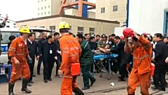 Two dead, 18 trapped in mine collapse in China