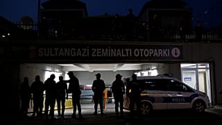 Police outside the car park where a Saudi diplomatic car was found.