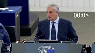 Antonio Tajani stares down Nigel Farage