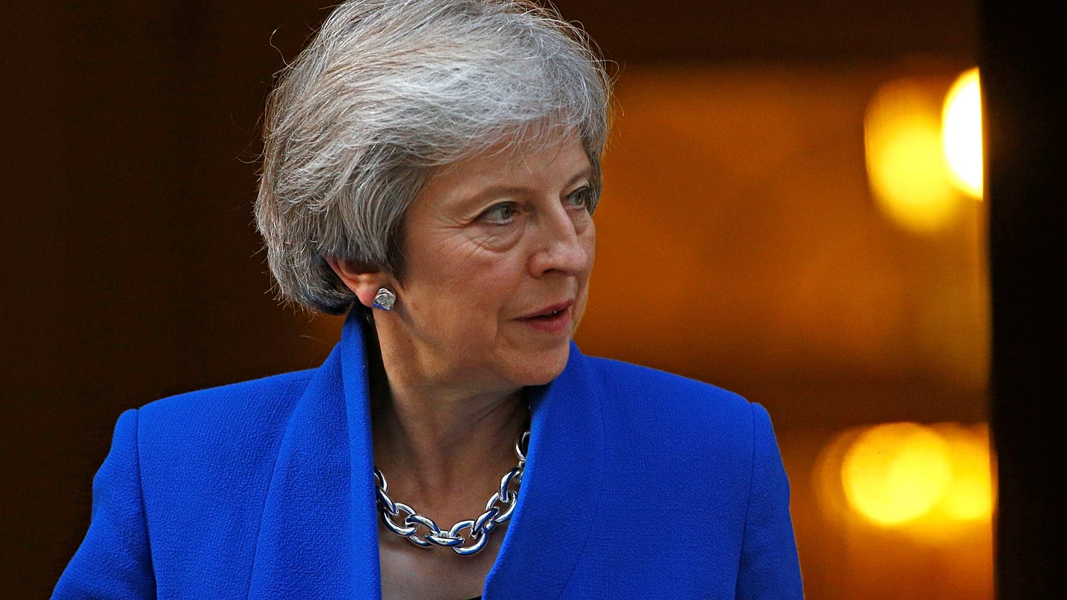 Britain's Prime Minister Theresa May stands at the door of 10 Downing St