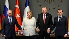 Macron, Merkel, Putin and Erdogan holding hands — an unlikely photo | Raw Politics 