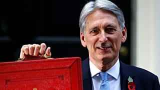 The UK Chancellor stands outside 11 Downing Street