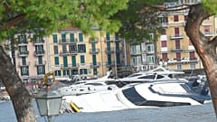 Semi-submerged yachts are seen in the harbour after windstorm and the stron