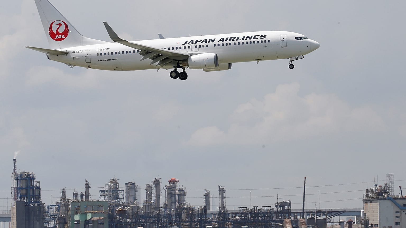 Japan Airlines apologises after arrested co-pilot was close to '10 times over alcohol limit'