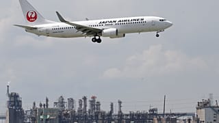 Japan Airlines apologises after arrested co-pilot was close to '10 times over alcohol limit'