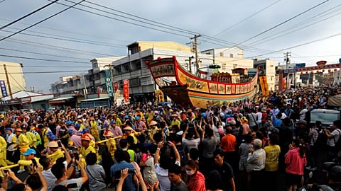 Wooden boat set alight in Taiwan to ward off bad luck, disease