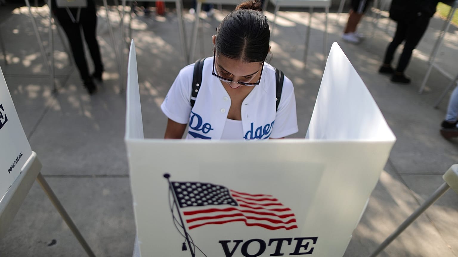 A voter makes her choice in the US midterm elections.