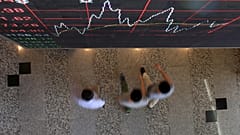 Asian shares inch up, investors brace for U.S. elections