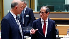 O comissário europeu Pierre Moscovici com o ministro Giovanni Tria
