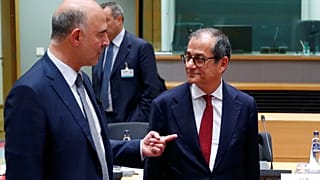 O comissário europeu Pierre Moscovici com o ministro Giovanni Tria