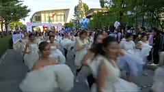 Running for their lives: Thailand's racing bridal couples