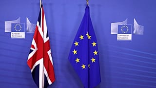 British and EU flags at the EC headquarters in Brussels