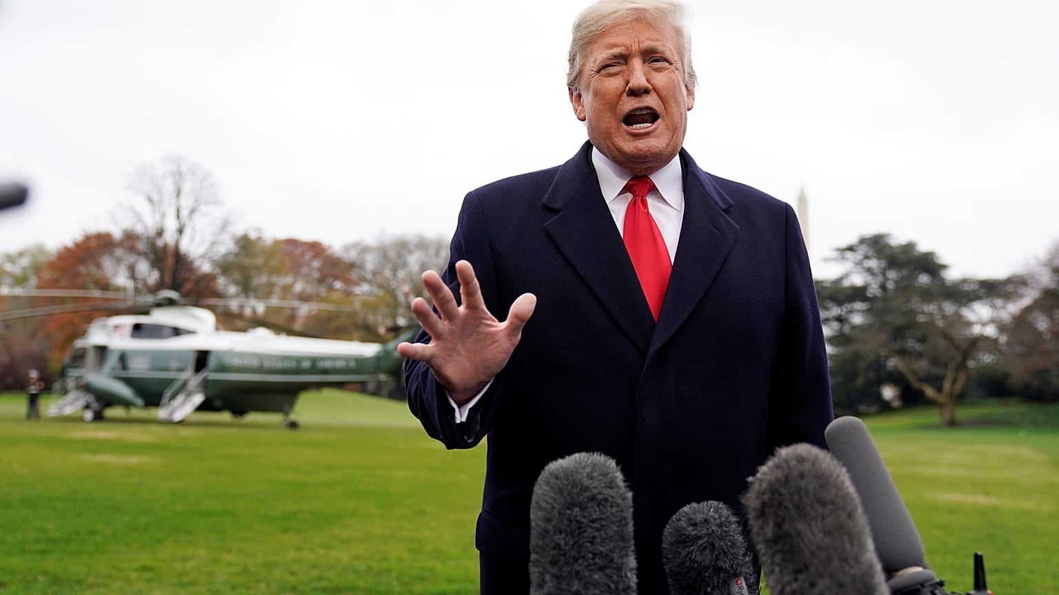 U.S. President Donald Trump talks to reporters on November 26, 2018.