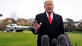 U.S. President Donald Trump talks to reporters on November 26, 2018.