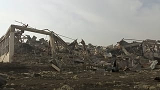 Blast crater at scene of Kabul attack were at least 10 were killed