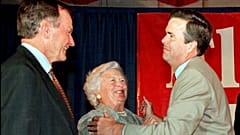 Former President George Bush (L), wife Barbara and son Jeb Bush