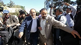 A member of the Houthi delegation departs for talks in Sweden