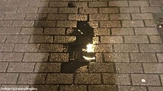 Puddle shape of Irish island spotted in Brussels street