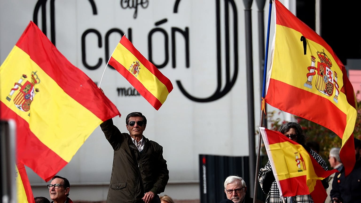 People gather at a rally calling for Spanish national unity in Madrid.