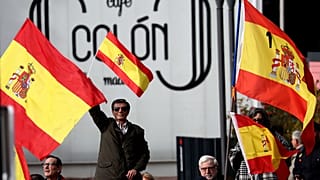People gather at a rally calling for Spanish national unity in Madrid.