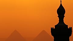 Sun sets over Great Pyramids of Giza where the couple alledgeldy posed nude