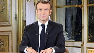 What does Macron's body language tell us about his TV address?