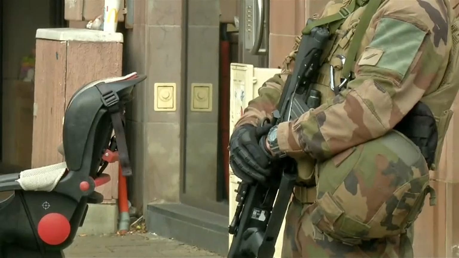 Police patrol Strasbourg while MEPs observe silence for the victims of gun attack