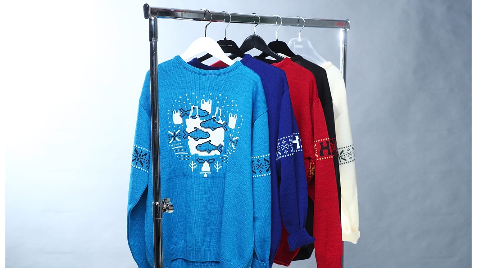 These sweaters tell the ugly truth about the world