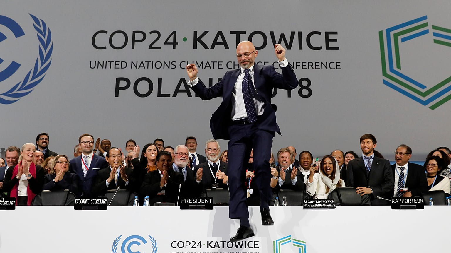 Michal Kurtyka jumps for joy as a deal is announced