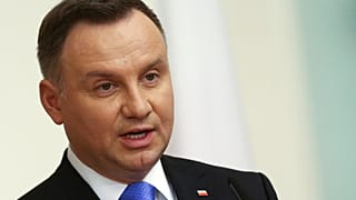 Poland's President Andrzej Duda speaks during a news conference