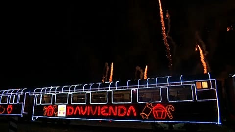 Illuminated train chugs through Bogota bringing Christmas cheer