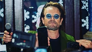 Watch: Bono and The Edge busk to raise money for homeless charity in Dublin