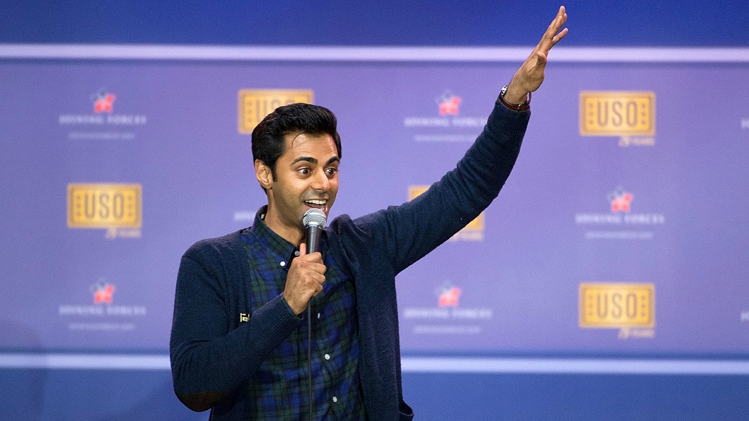 Minhaj performing in 2016