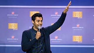 Minhaj performing in 2016